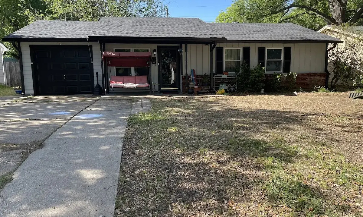 Asphalt Shingle Roof Repair crew at work on a residential roof in Robeson